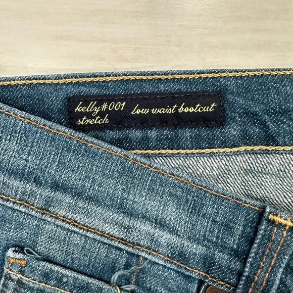 Citizens of Humanity “Kelly” Stretch Low-Waist Boot Cut Jeans
